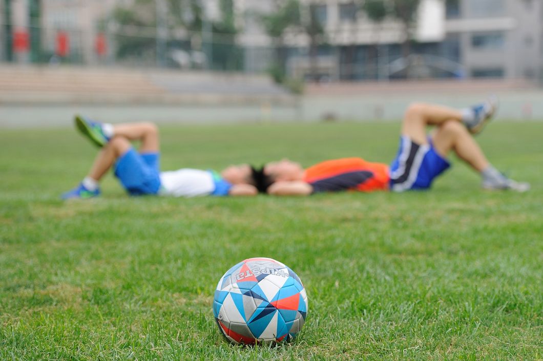 https://www.pexels.com/photo/woman-playing-soccer-ball-on-grass-258395/