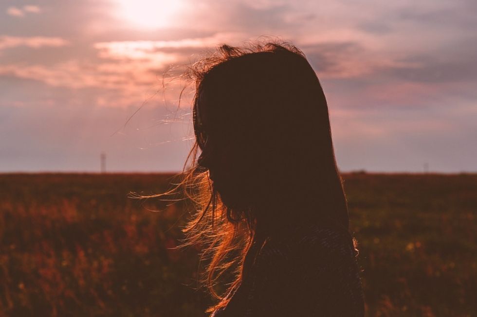 https://www.pexels.com/photo/woman-s-silhouette-photo-during-sunset-185517/