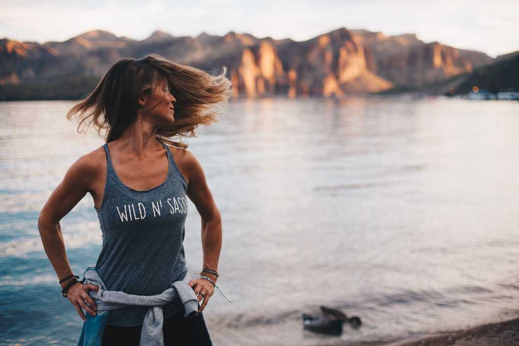 https://www.pexels.com/photo/woman-wearing-grey-wild-n-sassy-tank-top-near-body-of-water-670626/