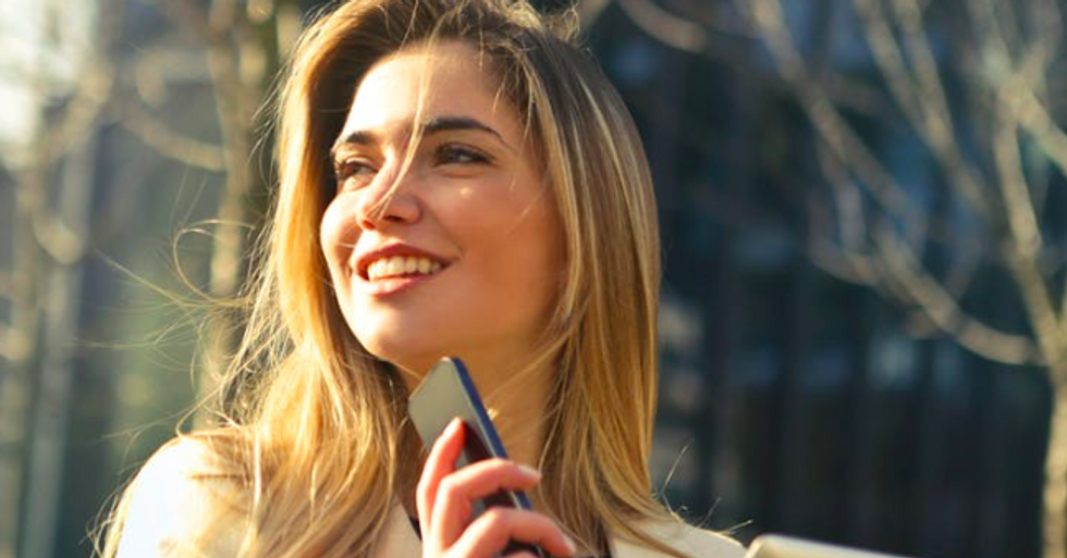 https://www.pexels.com/photo/woman-wearing-white-top-holding-smartphone-and-tablet-864994/