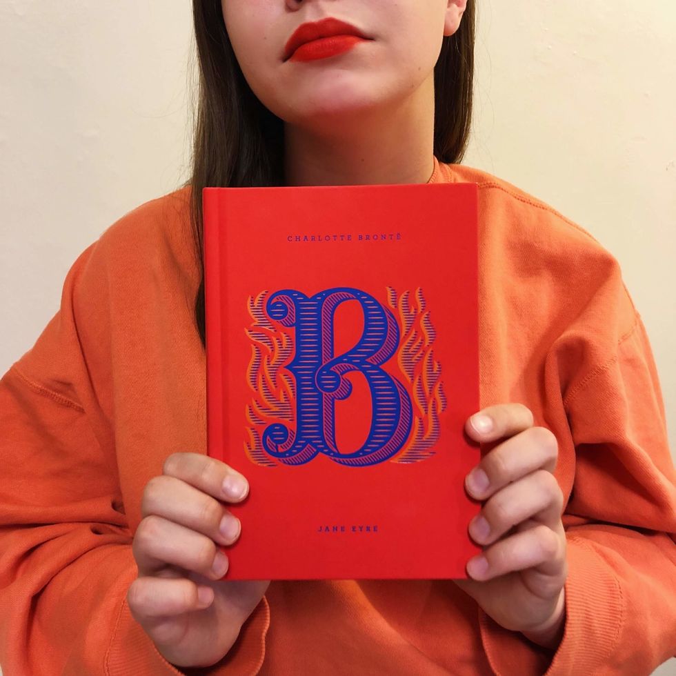 Image of myself holding a copy of Charlotte Brontë's "Jane Eyre".