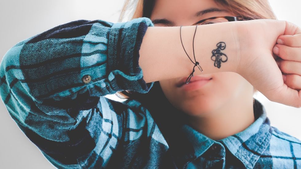 10 Tiny Tattoos For A Minimalist