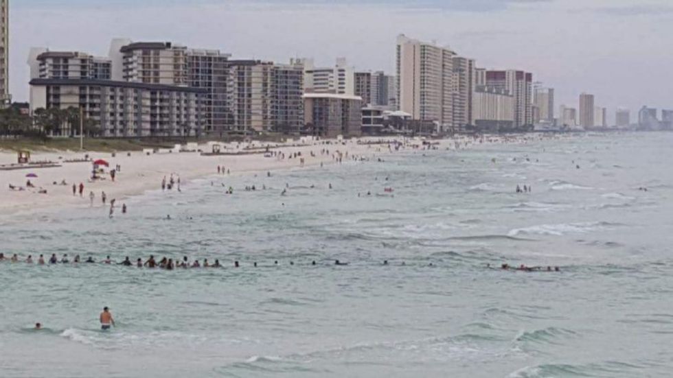 Faith In Humanity Restored: Family Saved By Human Chain At Beach