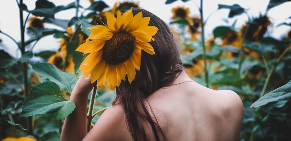 17 Of The Best Poems From Rupi Kaur's 'The Sun And Her Flowers'