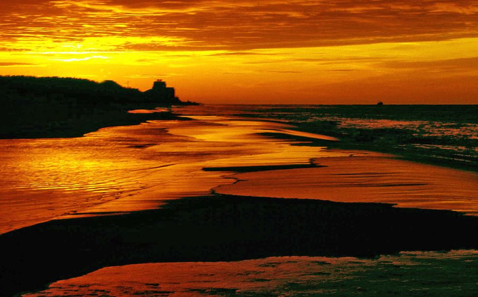 A Bronze Lady, A Glowing Woman, Or A Goddess?