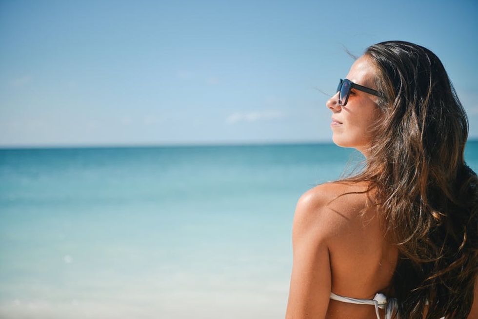 8 Unique Hairstyles For Your Next Trip To The Beach