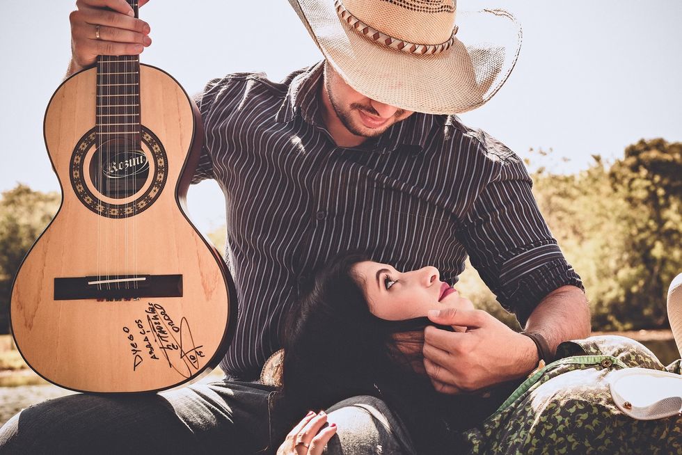 26 Country Jams That Prove There's A Cowboy Drinking 'Tequila' Waiting On You