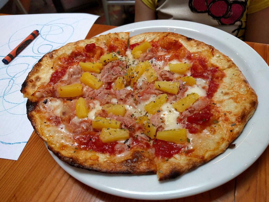 Embrace Pineapple On Pizza This National Pizza Month