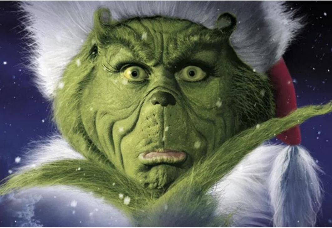 The Very True Story Of How 'The Grinch' Movie Made Me Throw Up On A Plane