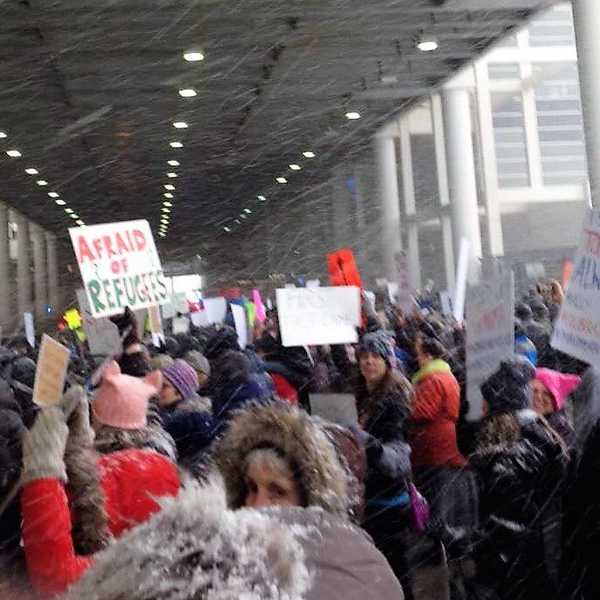 "You are welcome here," Shout Protesters at Detroit Metropolitan Airport