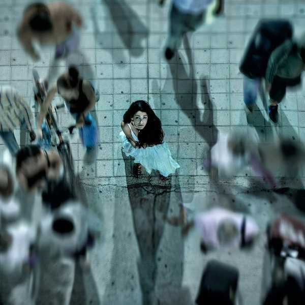 Alone In A Crowd: A Poem