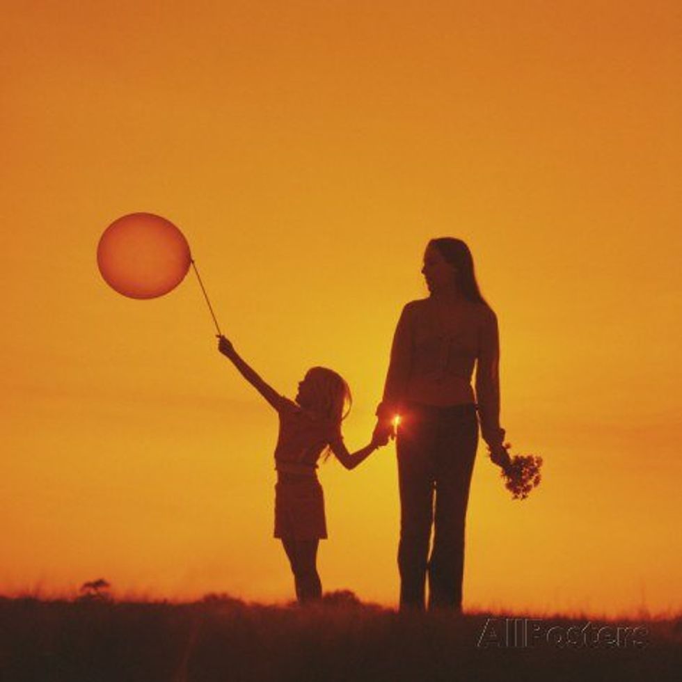 5 Signs You Were Raised By A Strong Mom