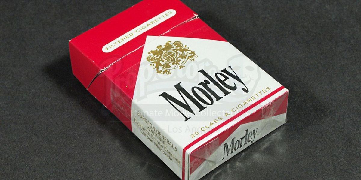 cigarette pressed between her lips Close-up of a woman's lips with red lipstick smoking a cigarette against a dark background 70854382 Stock Photo at Vecteezy