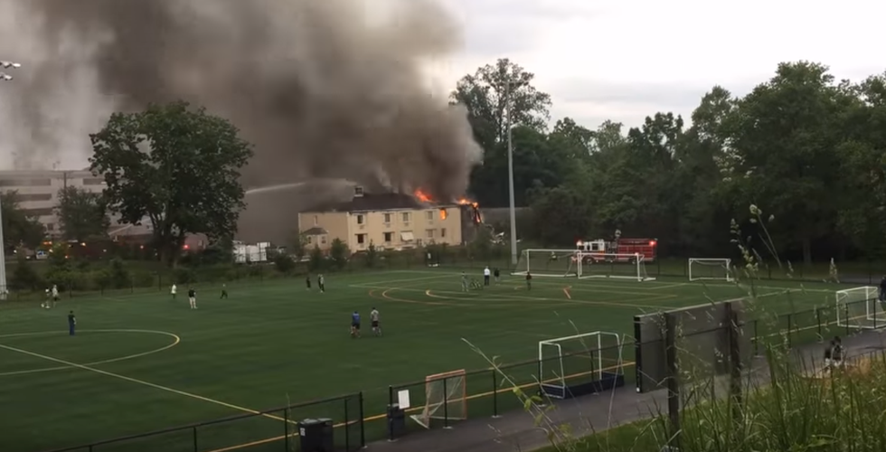 A Year After It Burned, Why Is The Excel Inn and Suites Still Standing