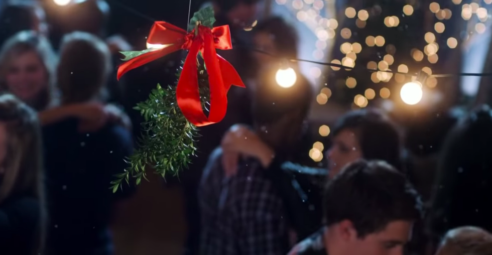 What's Really Going On With People Kissing Under The Mistletoe?