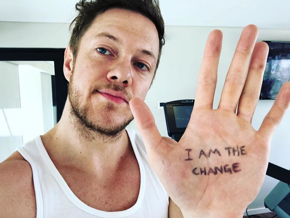 imagine dragons pictured saying "i am the change"
