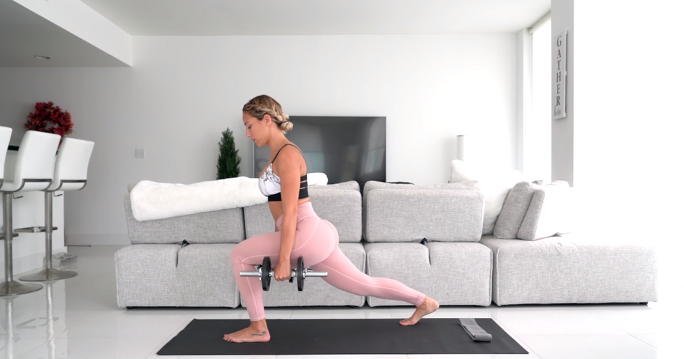 influencer works out in living room