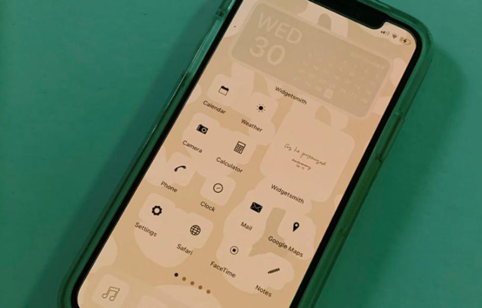 iPhone with tan background