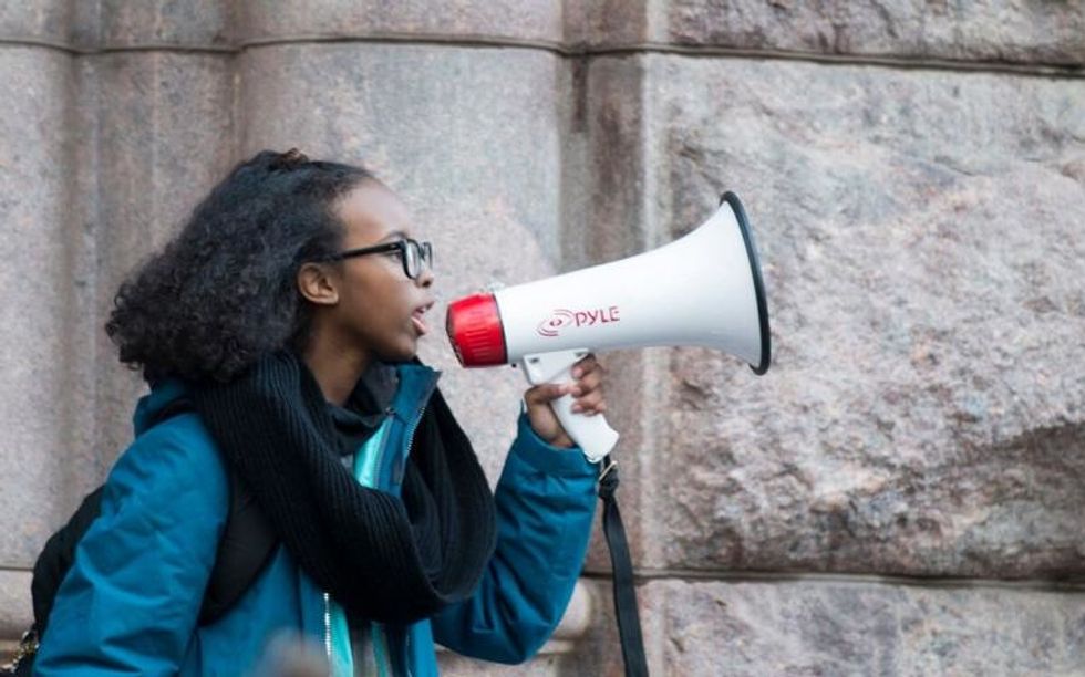 Isra Hirsi (16), daughter of US Representative Ilhan Omar