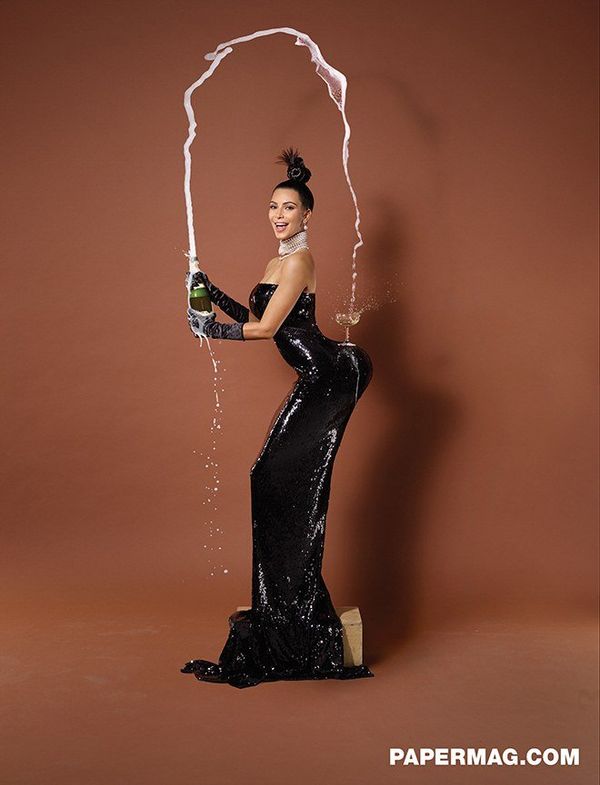 Kim Kardashian pours champagne onto her big butt