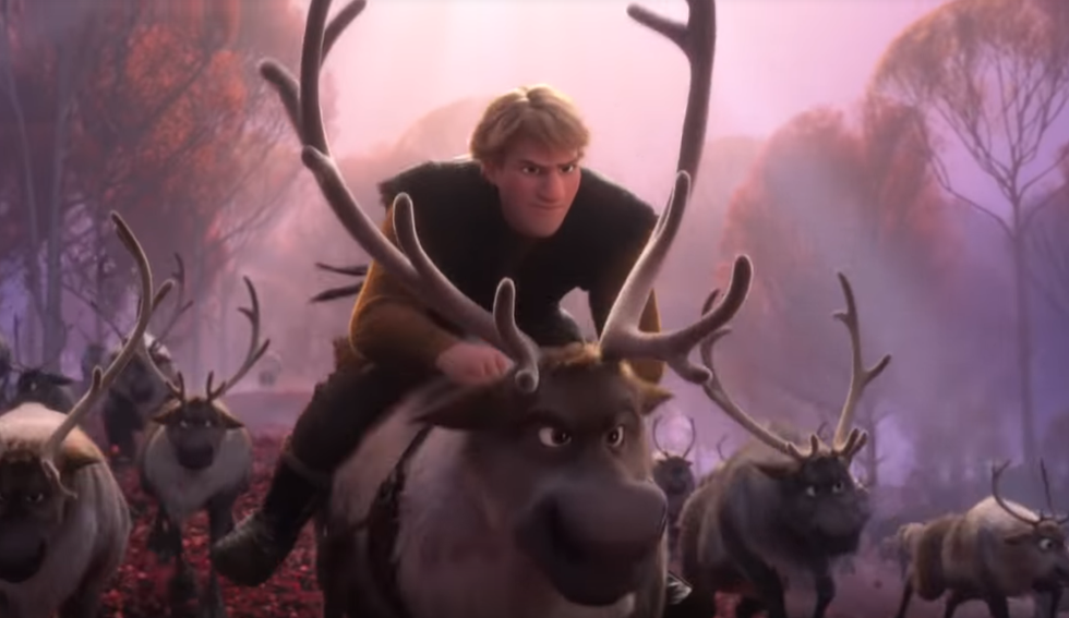 Kristoff leading a herd of reindeer
