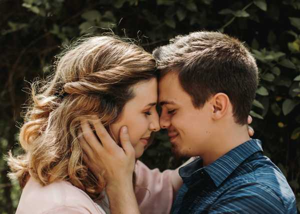 Man and woman touching foreheads