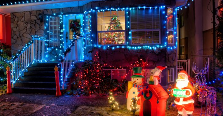 man puts up christmas decorations after breaking into home
