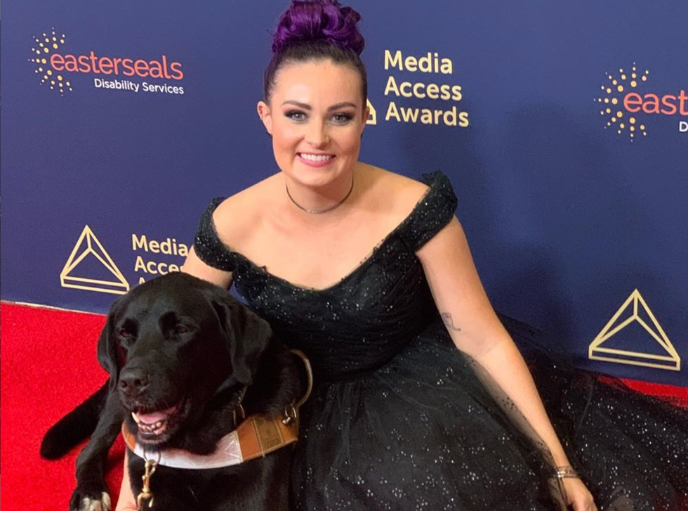 Molly Burke and her seeing-eye dog, Gallop​