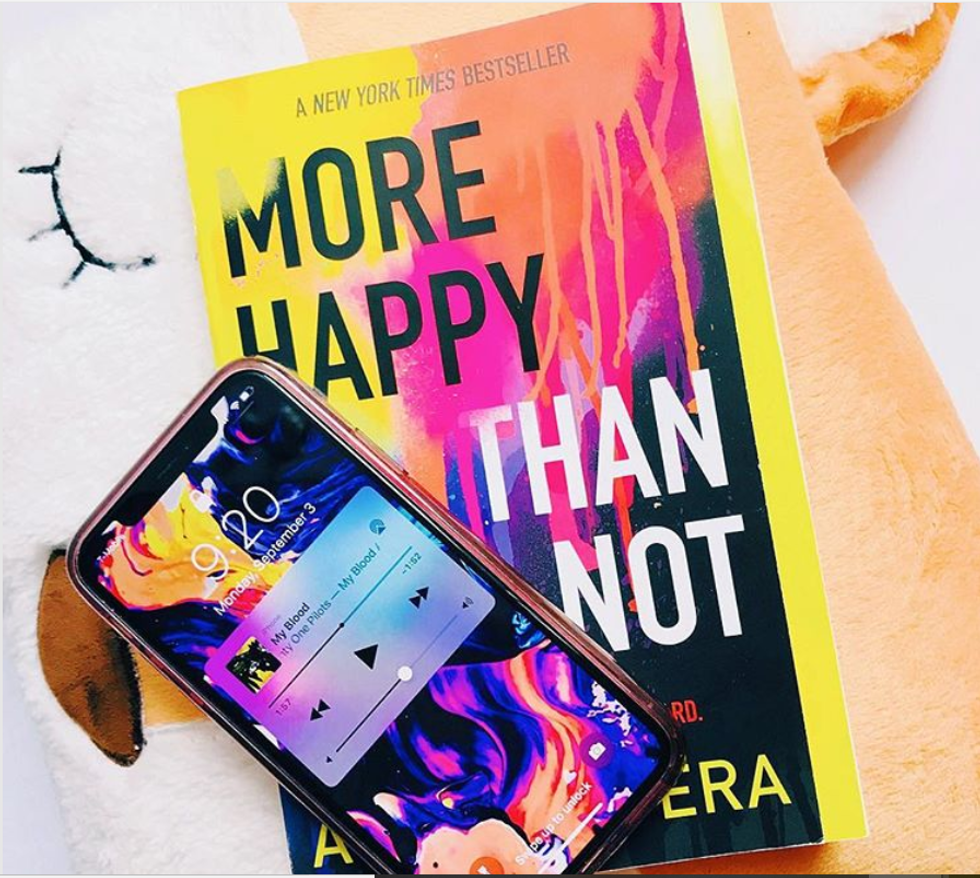 "More Happy Than Not" book and iPhone