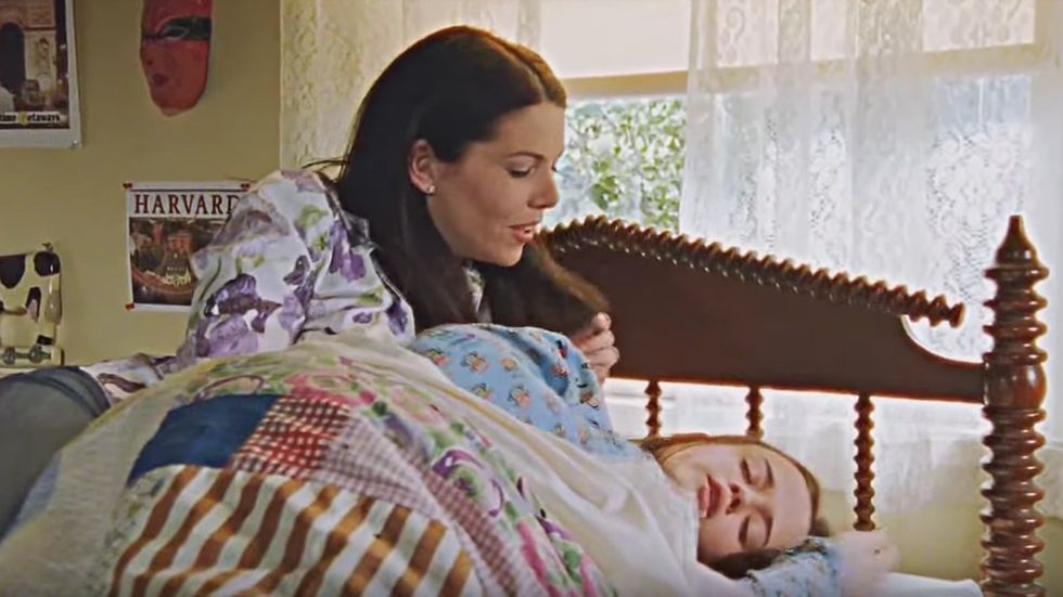 Mother holding her daughter