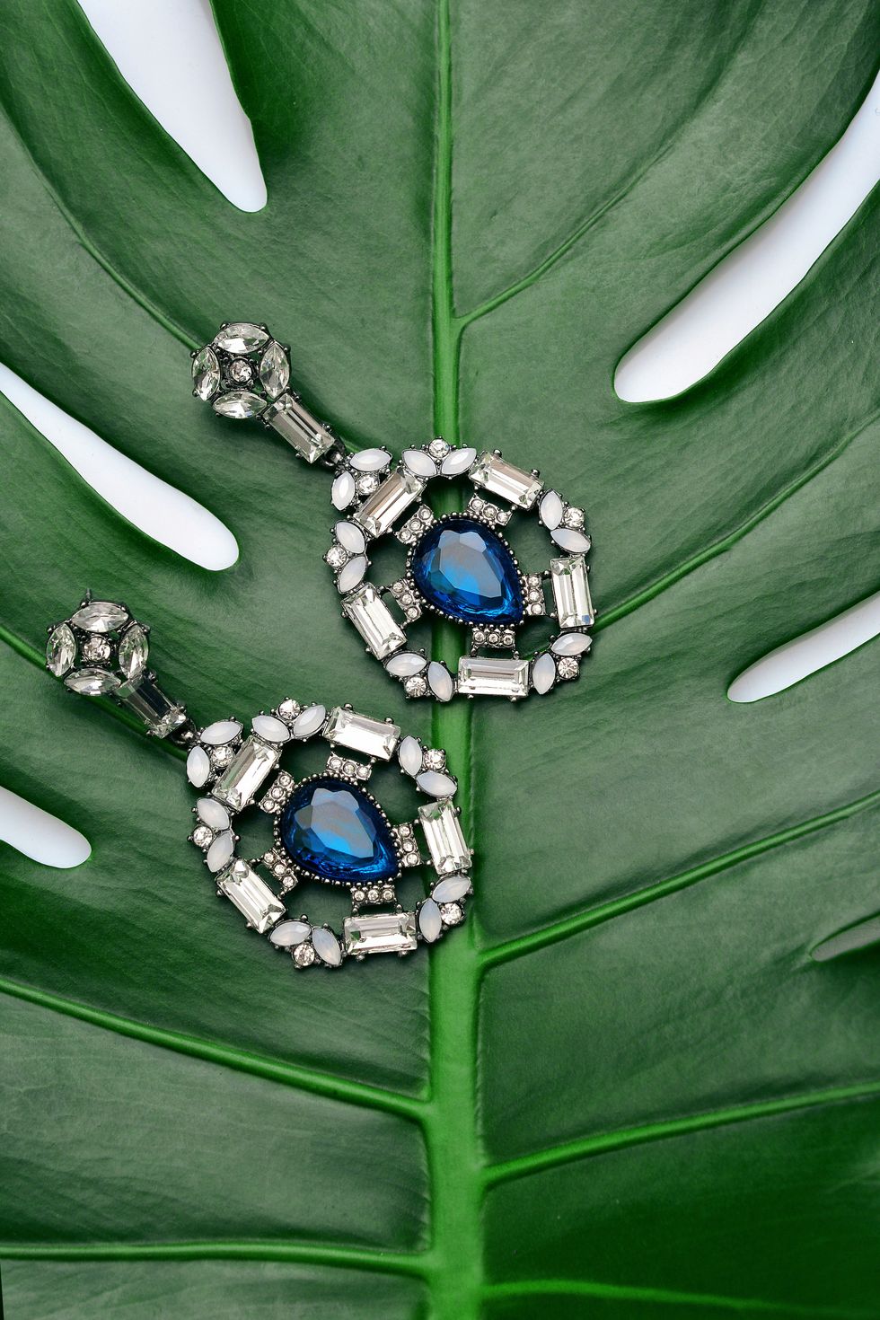 Pair of silver and blue gemstone earrings