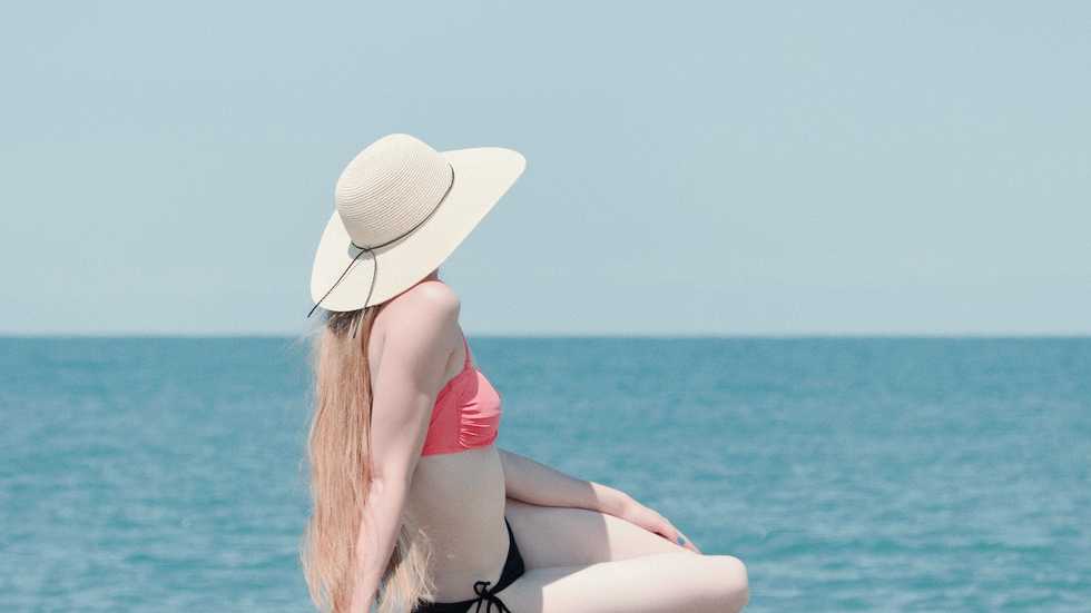 pale woman sitting in the sun