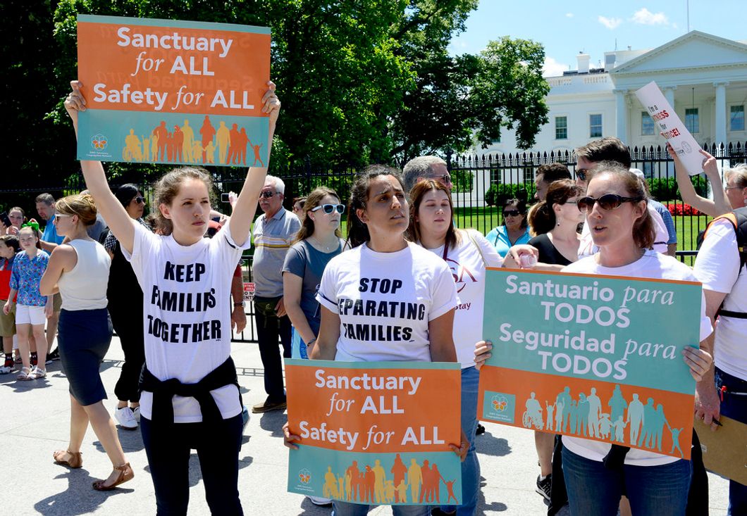 People protesting Trump's policies