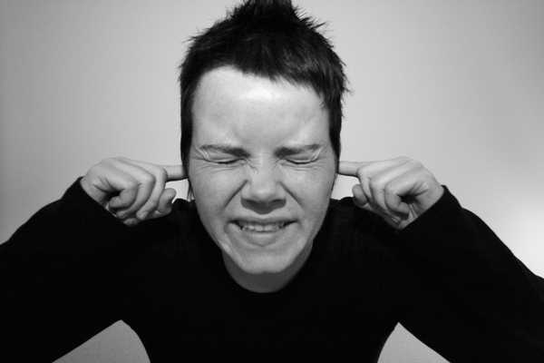 person covering ears