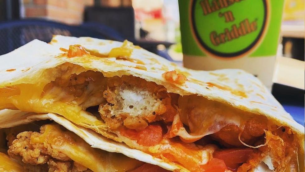 Person holding an ice cream sandwich