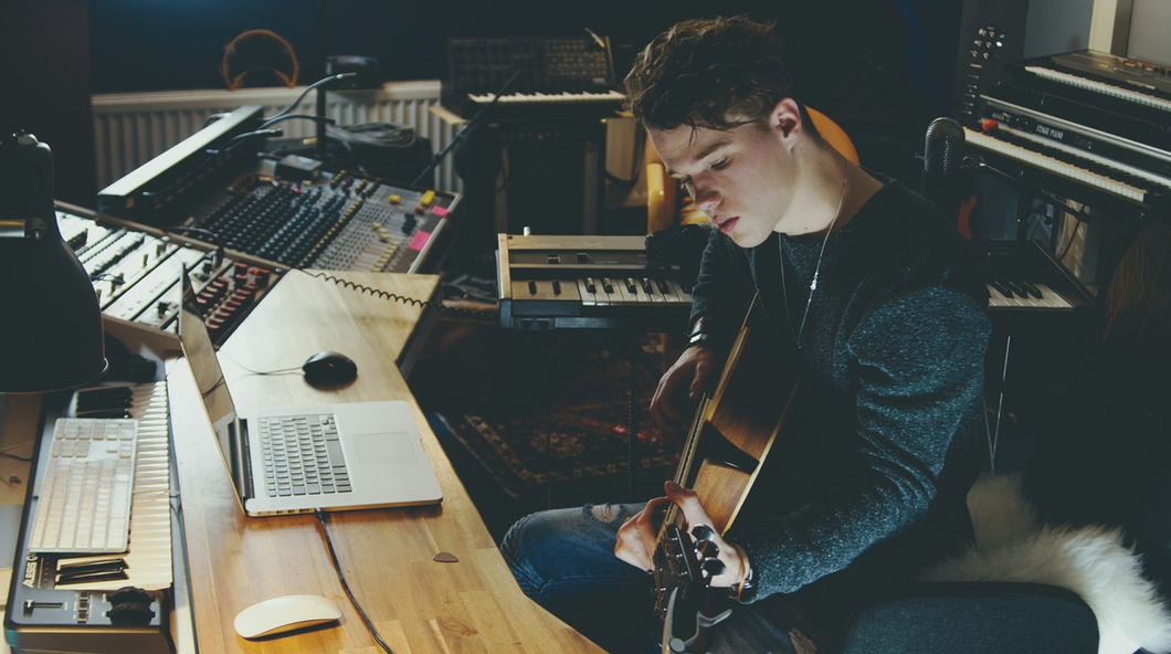 person playing guitar