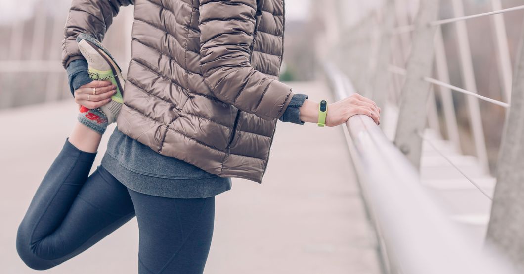 Pexels- a woman stretching on a bridge