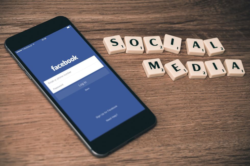 Phone, facebook, scrabble, social media
