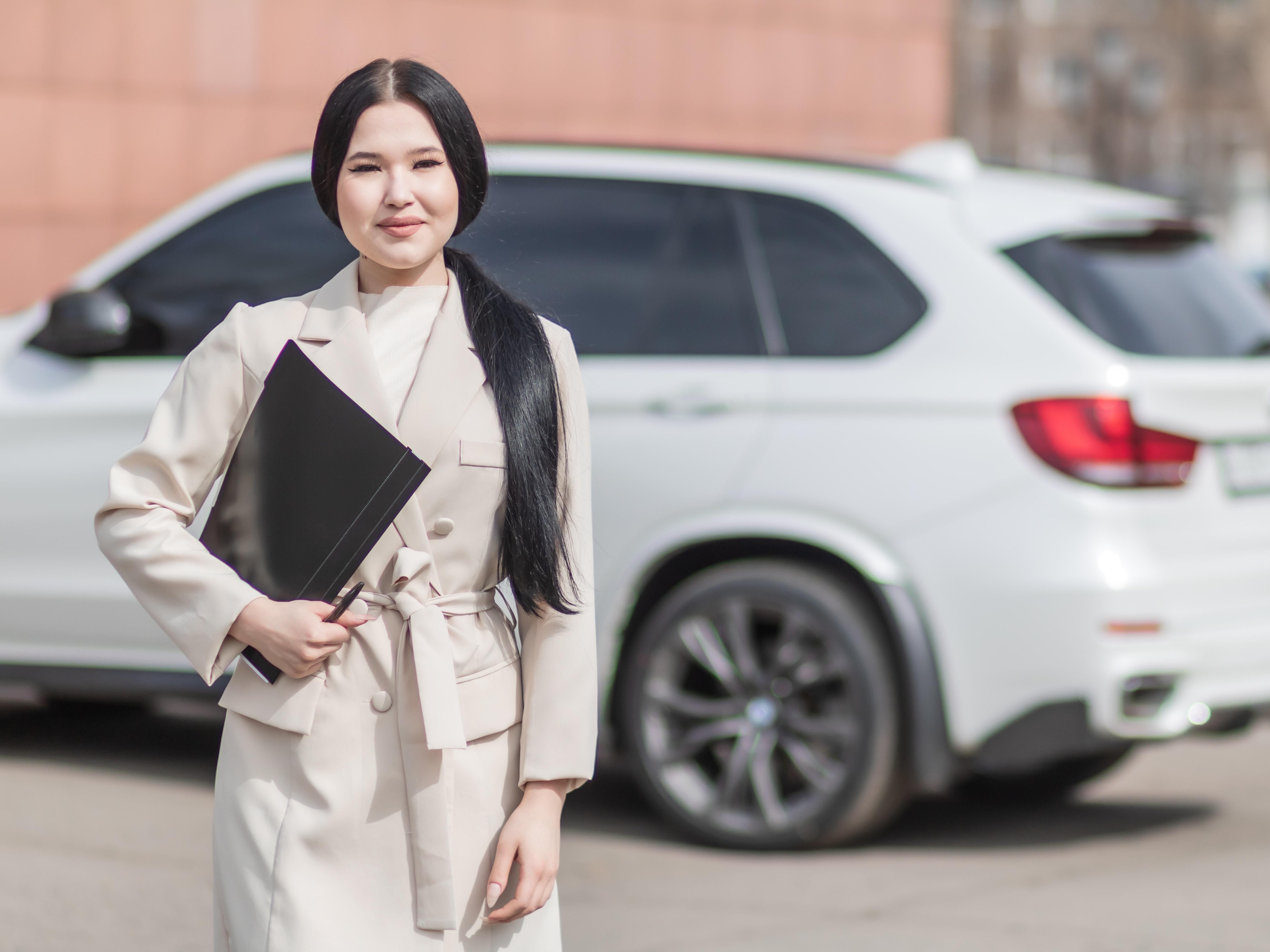 Photo by Mikhail Nilov: https://www.pexels.com/photo/woman-in-beige-corporate-clothes-holding-black-folder-7736045/