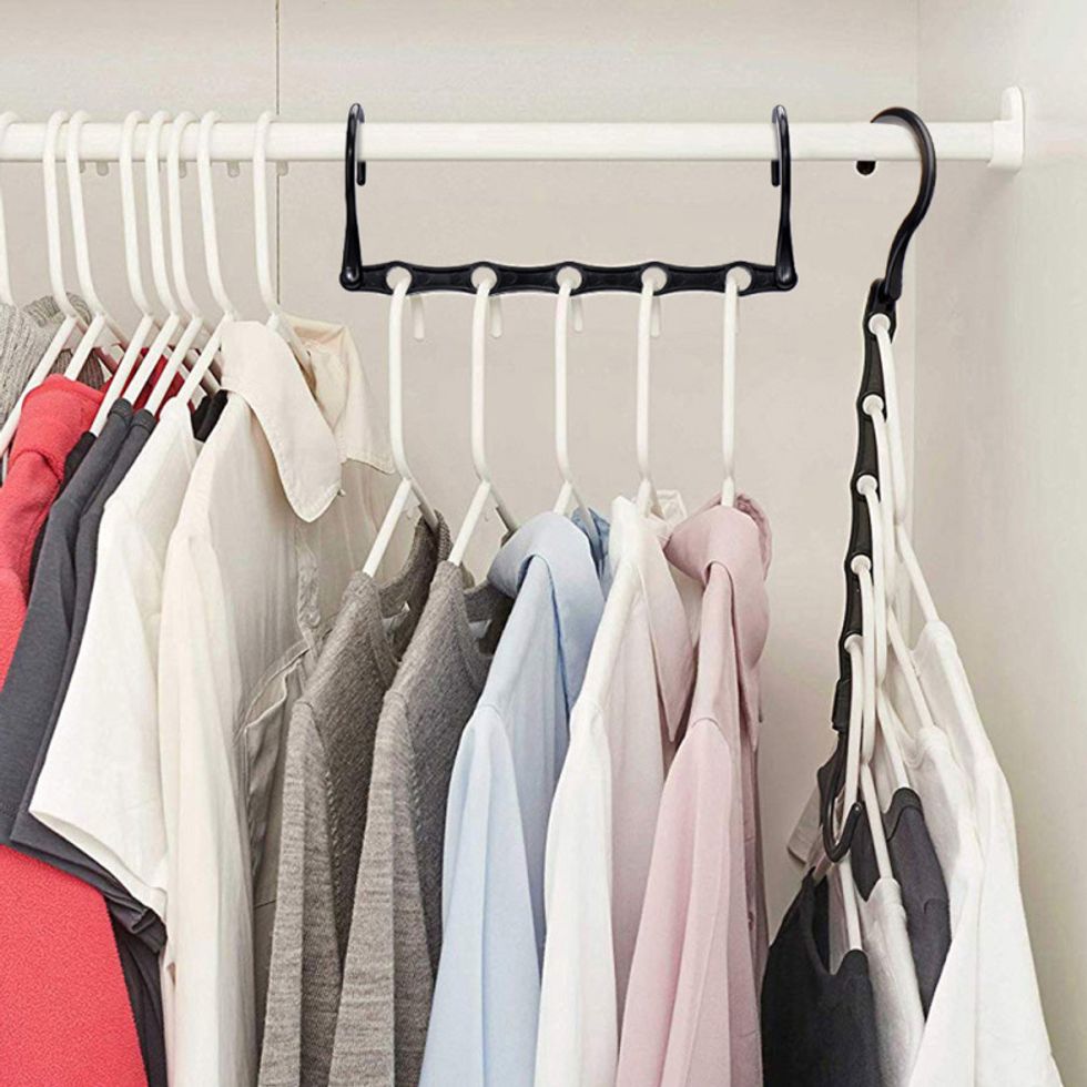 Picture of a closet rod with space saving hangers in their two modes.