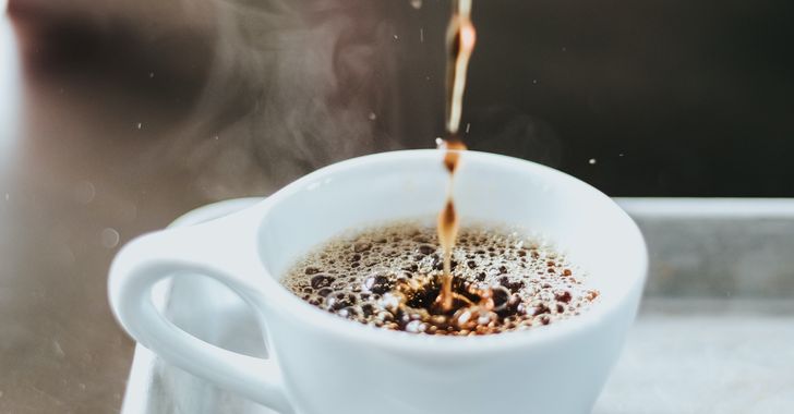 piping hot coffee cup