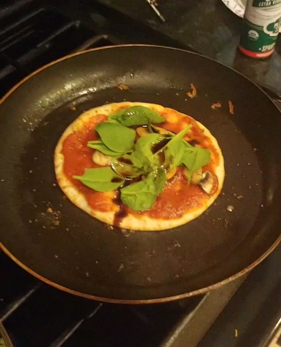 pita bread with sauce and cheese