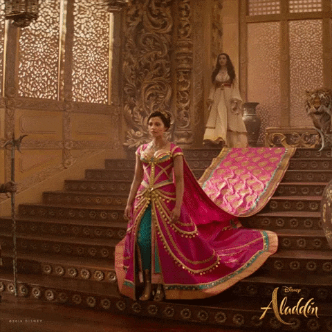 Princess Jasmine enters her palace ballroom with her handmaiden Dalia.