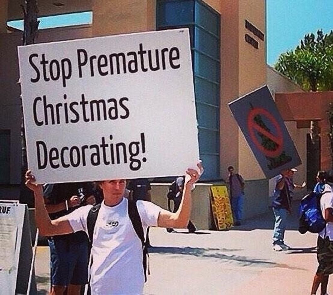 Protest, Christmas, Christmas decorations, decorations, decorating, man, funny