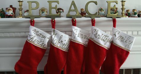 red stockings hung with care on a mantel