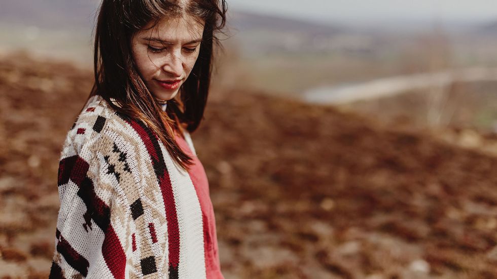 sad woman alone in nature