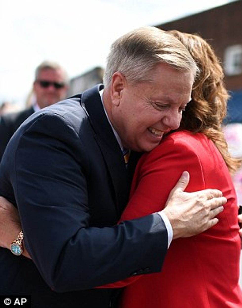 Senator Lindsey Graham hugging a woman