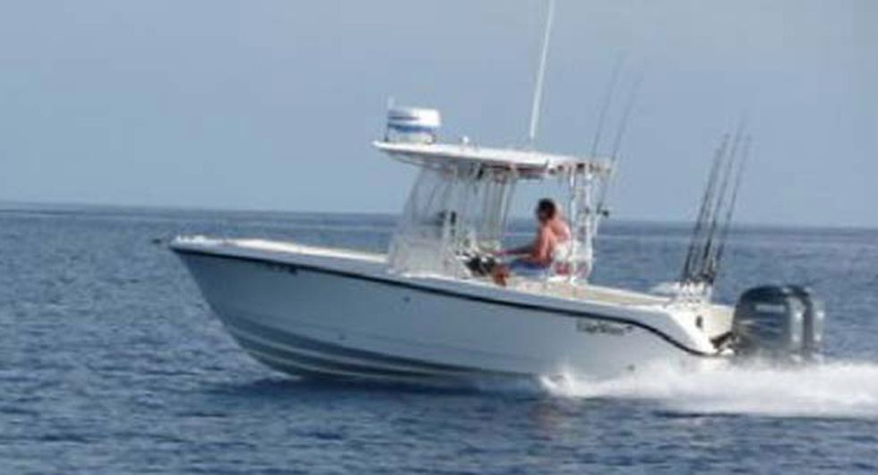 Senator Marco Rubio driving a boat