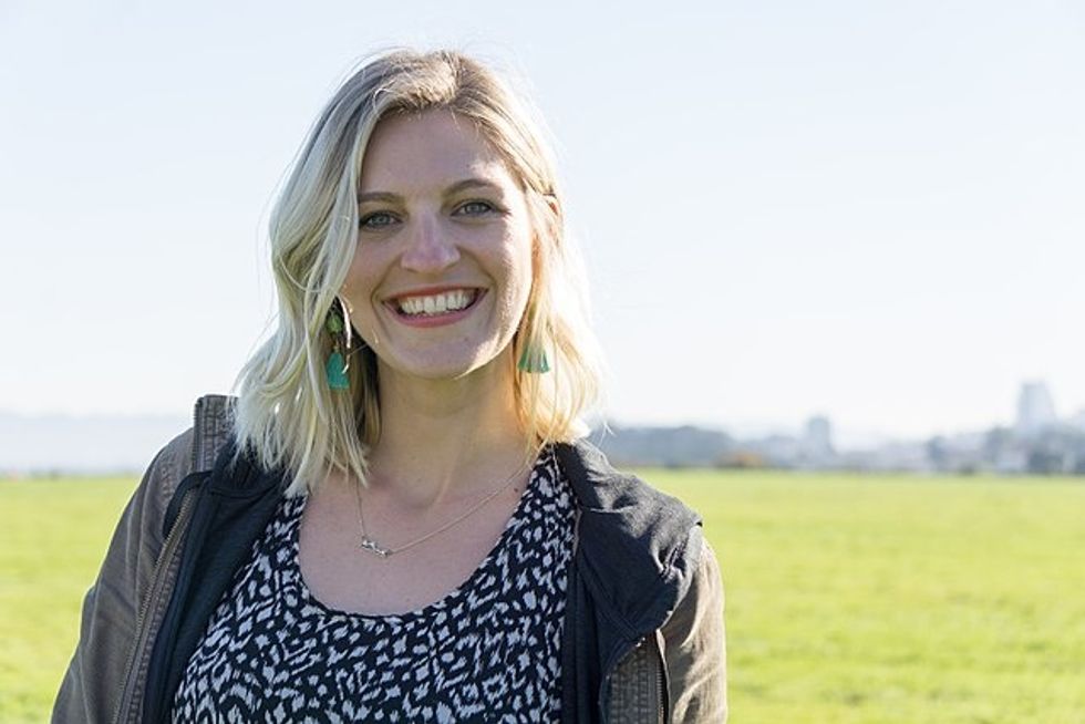 smiling woman in field