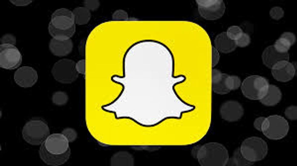 snapchat logo with black background